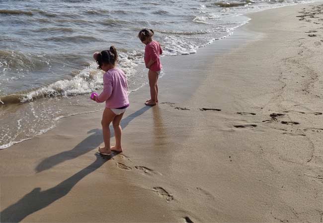 My nieces Praia de Santo Amaro de Oeiras in mid May