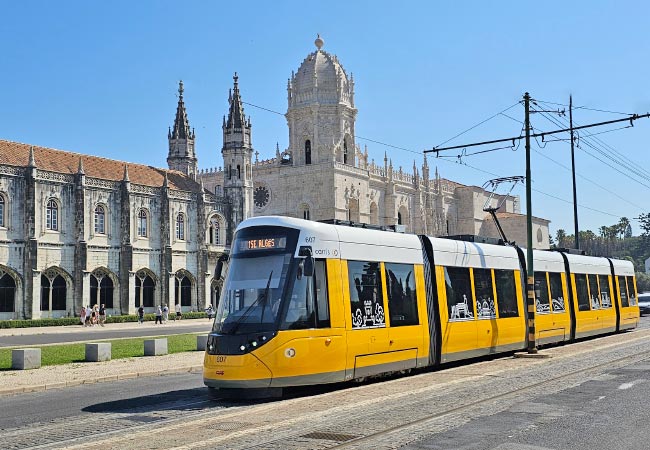E15 Tram passing the Mosteiro dos Jerónimos in Belem