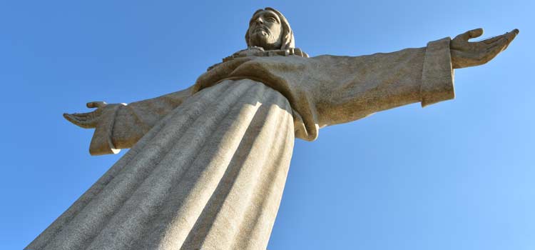 Image result for Cristo-Rei (Christ the King) monument overlooking Lisbon.
